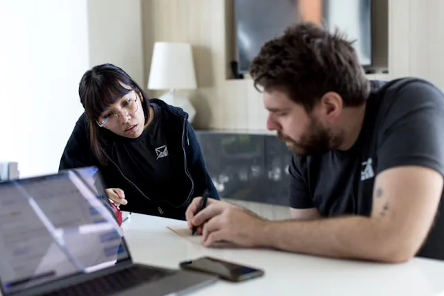 Small business owner reviewing digital tools required for launching online