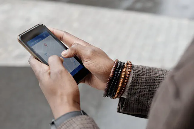 Mobile phone showing nearby business results on Google Maps in Melbourne