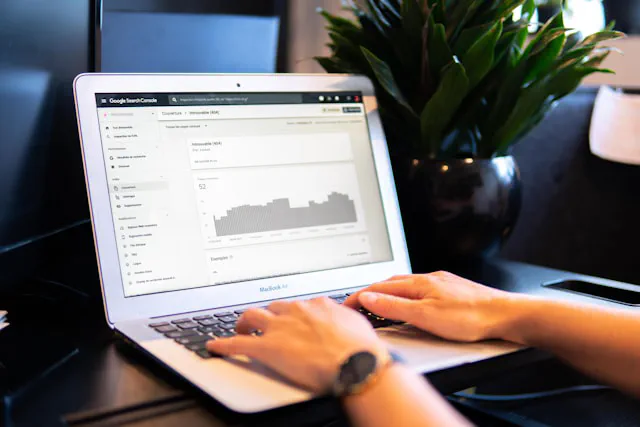Business owner analysing website performance and customer enquiries