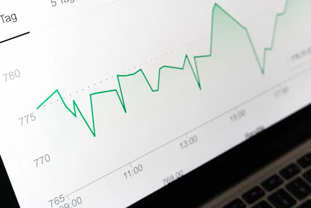 Small business owner looking at low website traffic analytics on a laptop